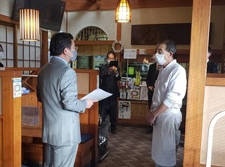 写真：ストップコロナ！認定店への支援制度周知活動
