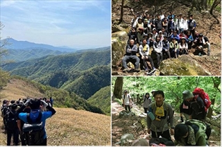 写真：新規採用職員と袈裟丸山登山