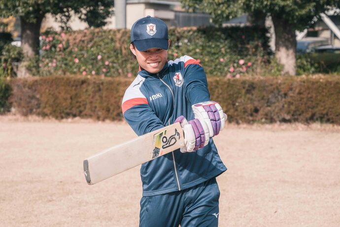 草木湖でSUPを楽しむ足立義継さん