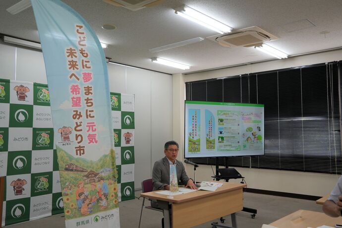 写真：記者会見（7月27日）